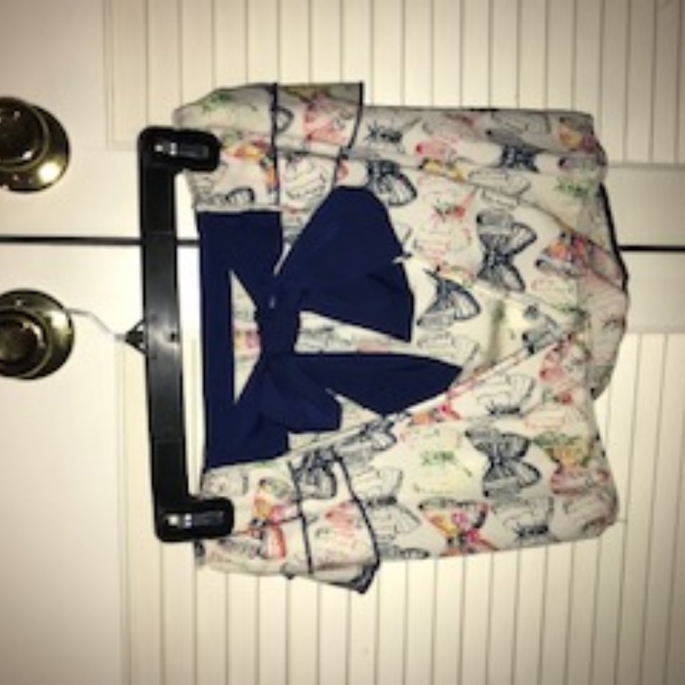 Cropped butterfly patterned top